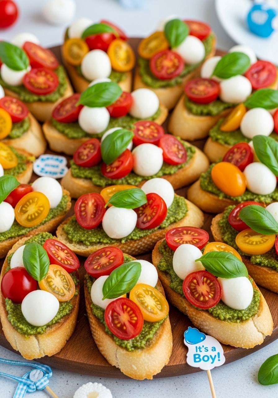 Fresh Caprese bruschetta made with halved cherry tomatoes and small mozzarella balls for a cute and delicious baby shower appetizer.