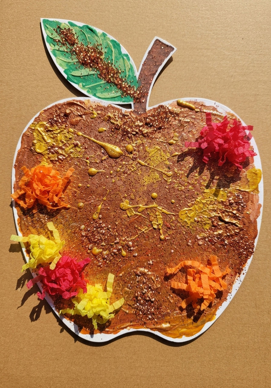 Apple art project with mixed media decorations for creative kids activity
