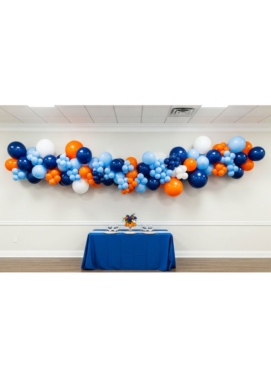 Large organic balloon garland in blue and orange colors spanning wall as Bluey birthday party photo backdrop