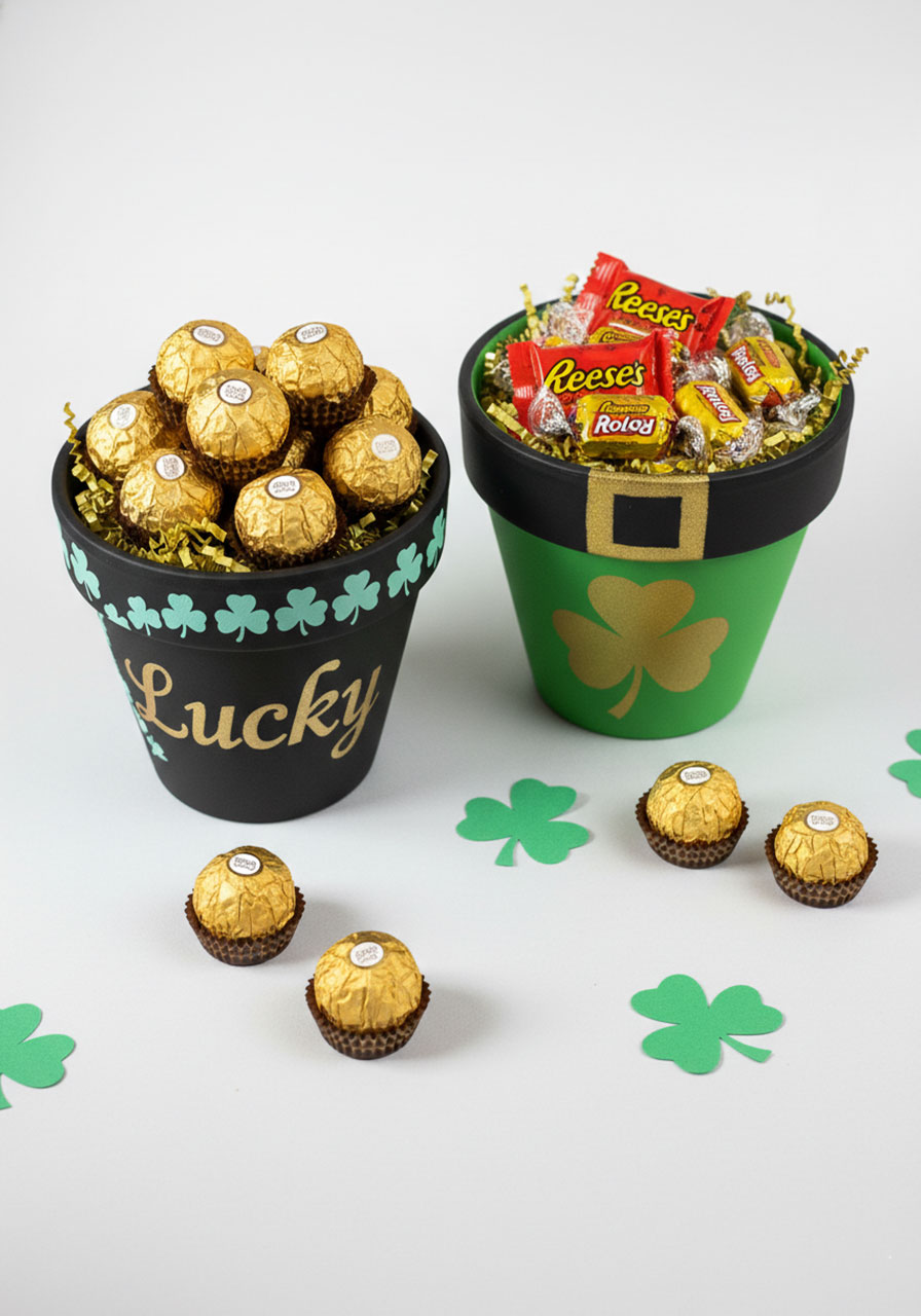 Two completed DIY pot of gold St Patrick's Day gifts filled with gold wrapped chocolates and candy ready to give