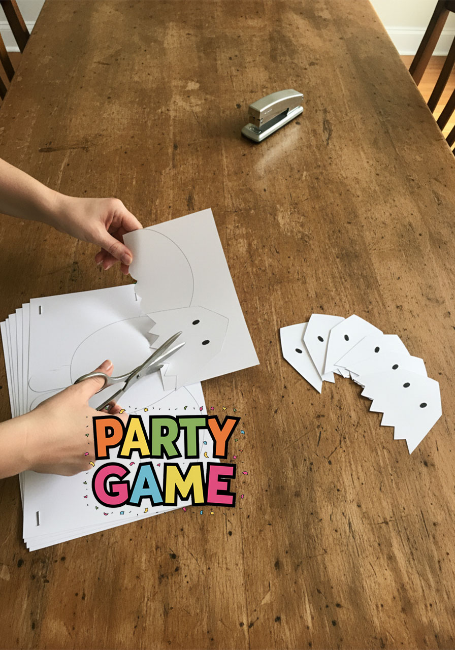 Adult hands cutting stacked stapled paper sheets using bald eagle template to make 10 shapes at once