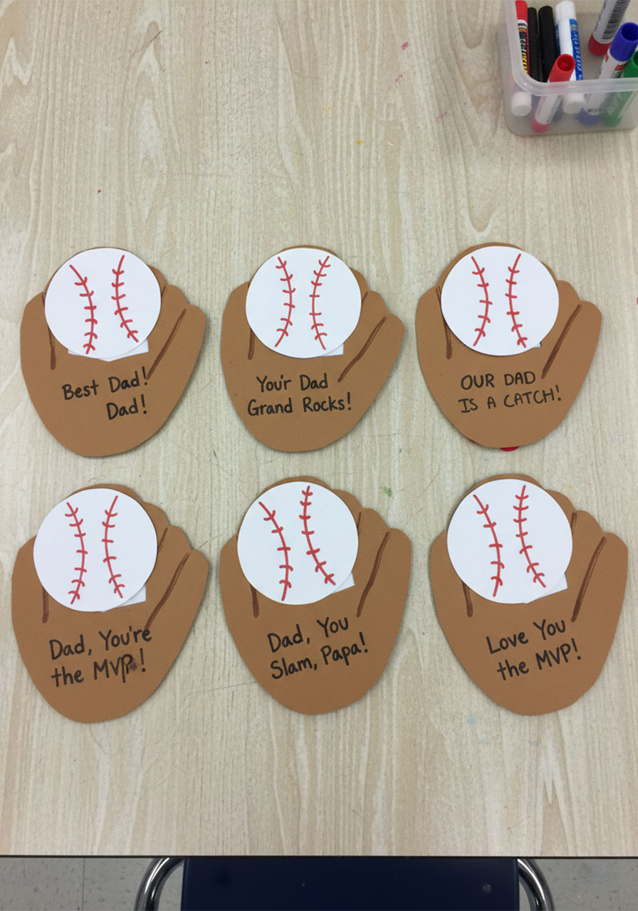 Six completed baseball glove Father's Day pop-up cards made by elementary students as a classroom Father's Day craft activity
