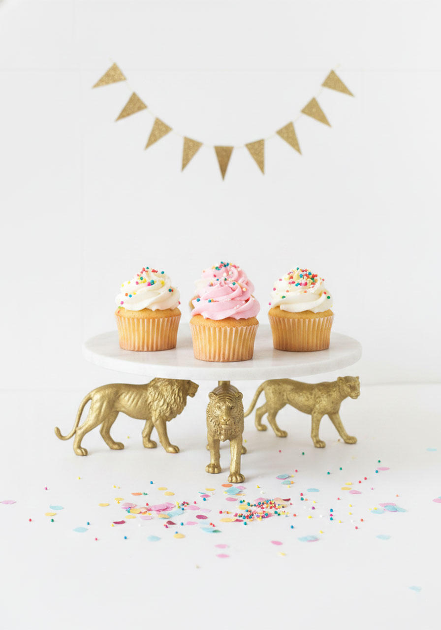 DIY gold wild cat animal cake stand with cupcakes for a tea party dessert table