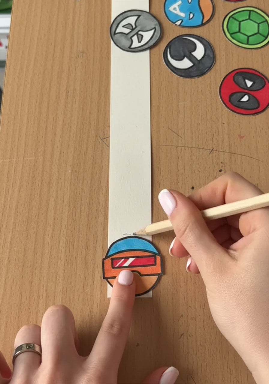 Measuring and marking even fold lines on a cardstock accordion strip for the DIY pop-up Father's Day card mechanism phase 2 step 2