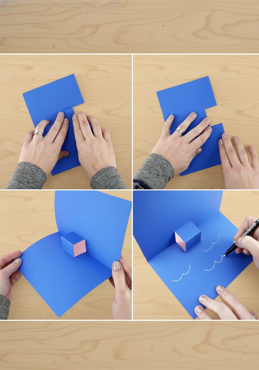 Royal blue cardstock card open at 90 degrees showing the pop up platform tab standing upright inside the card crease for Father's Day whale card step by step step6a