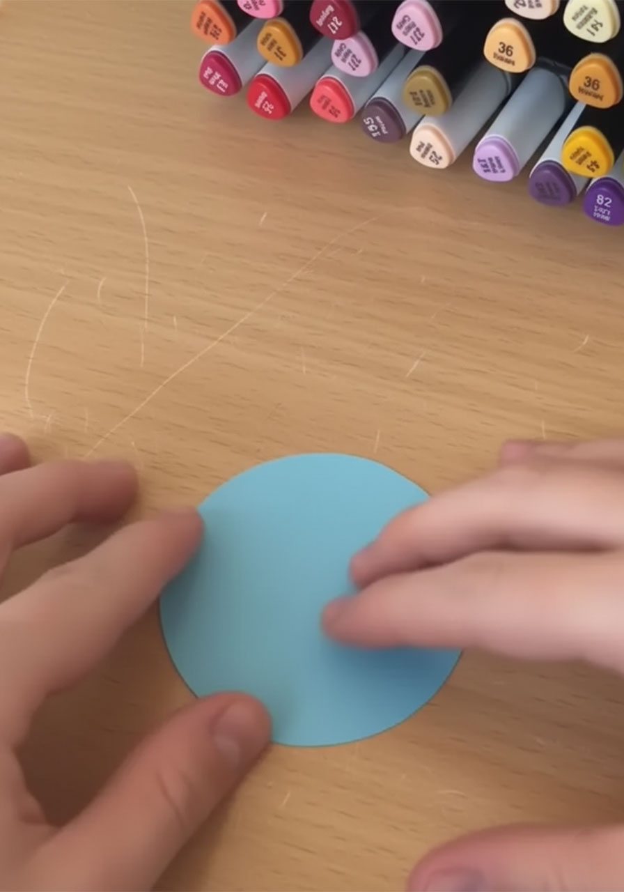 Foam adhesive tape squares on the back of a green paper continent creating the raised 3D effect on the handmade Father's Day globe card step5b