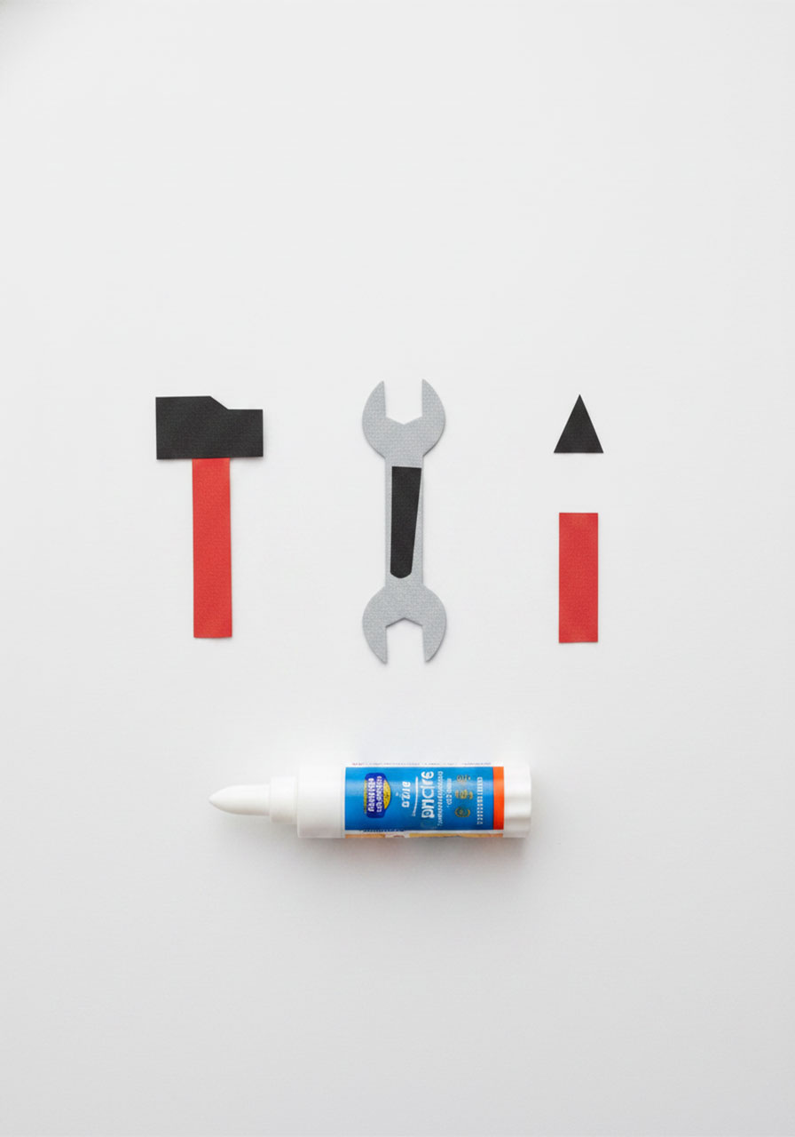 Tiny paper hammer wrench and screwdriver cut out from construction paper for Father's Day handy dad heart card