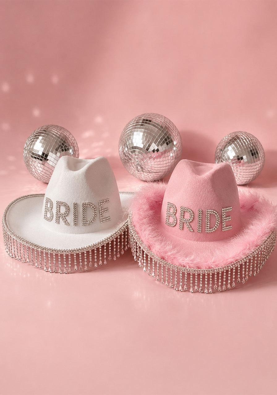 White and pink bride cowgirl hats with rhinestone fringe for last disco rodeo bachelorette party