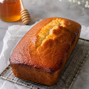 Moist honey tea cake loaf with golden honey glaze, just like grandma's recipe