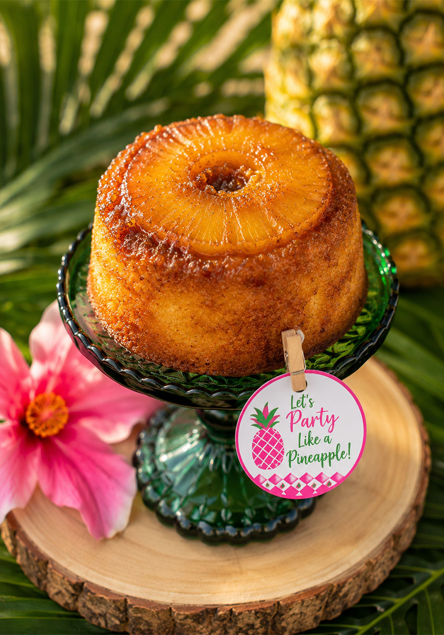 Mini pineapple upside-down cake on small pedestal stand as birthday party snack bar dessert idea