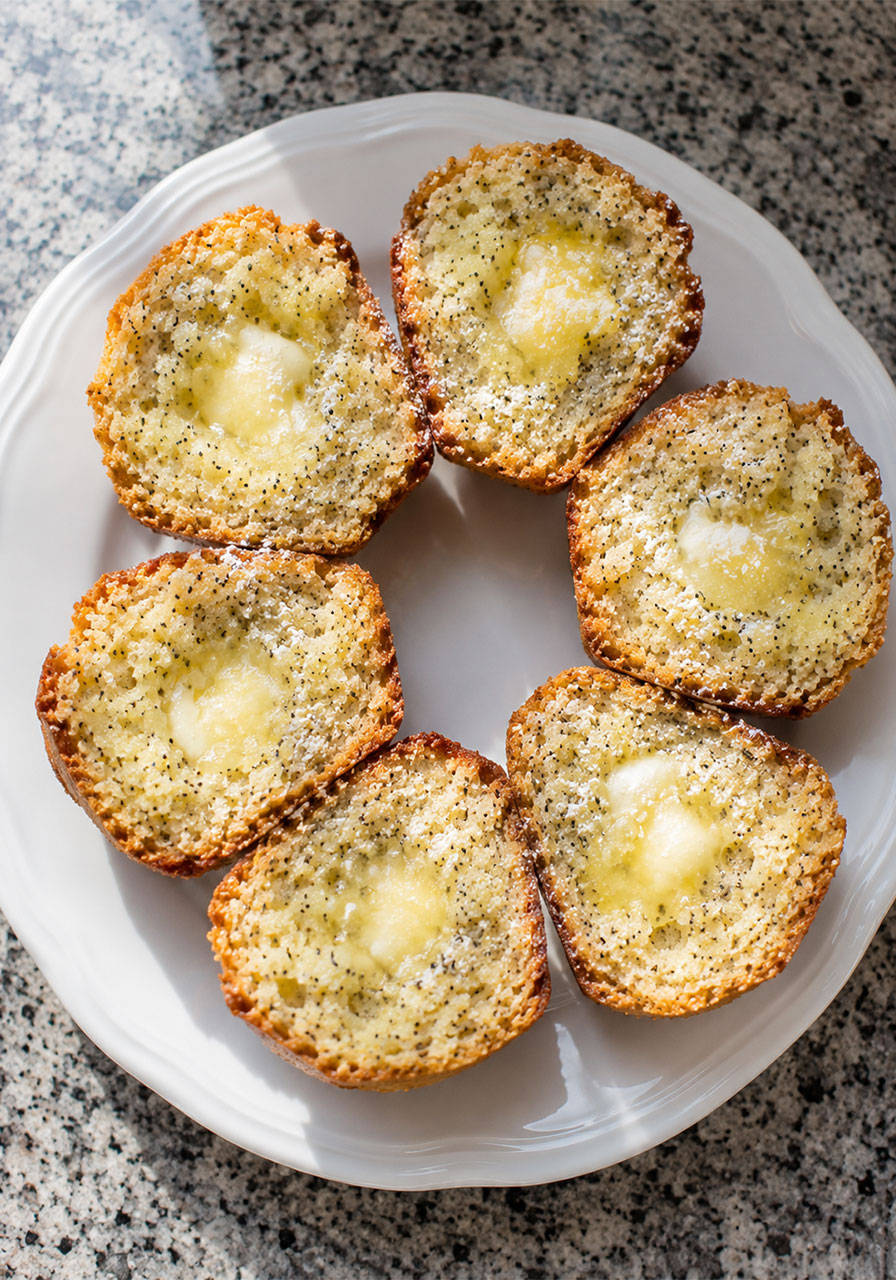 Toasted vegan poppyseed muffins served as a sweet tea party treat