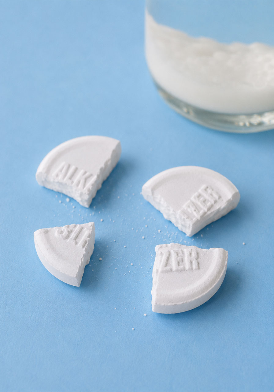 Broken Alka-Seltzer tablet pieces used for snowstorm in a jar science experiment