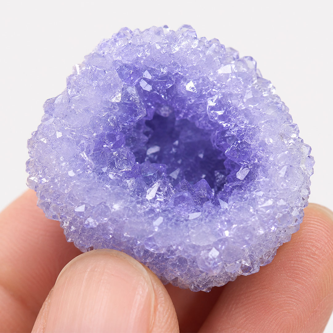 Close-up of purple borax crystal geode showing detailed mineral crystal texture