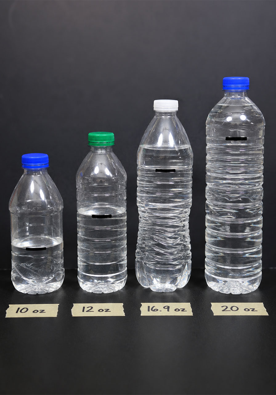 Bottle flipping STEM challenge for elementary classroom with four water levels