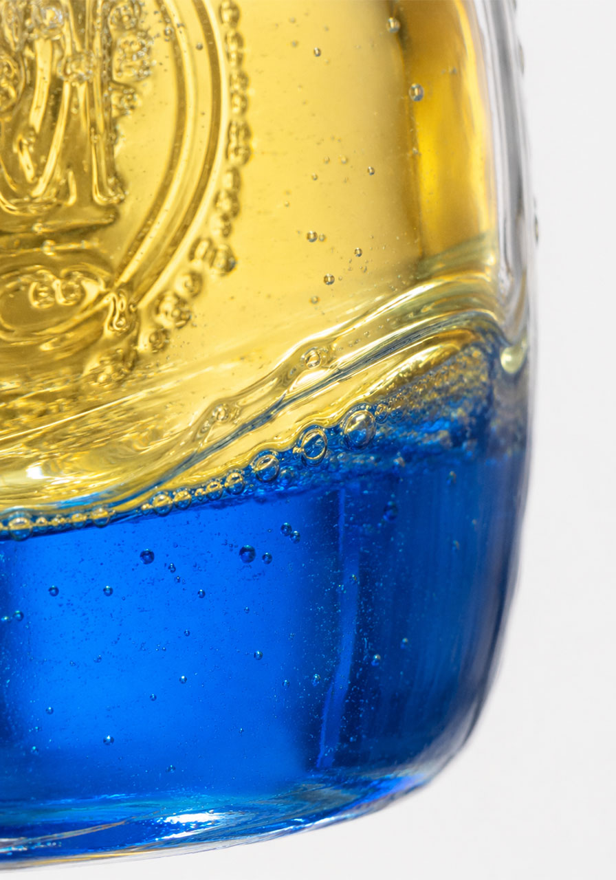 Close up view of wave crest forming between oil and water layers