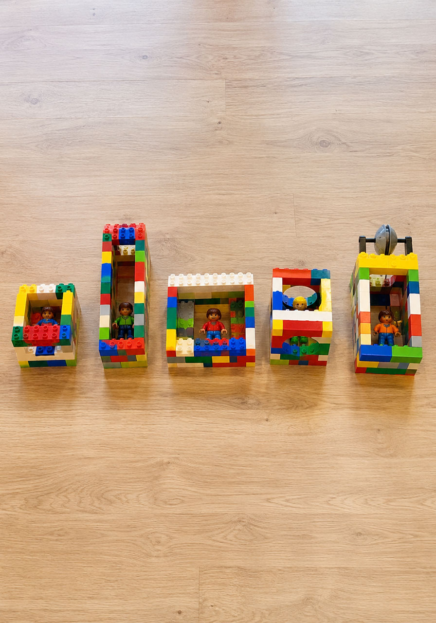 Five different LEGO cage design variations for a zip line STEM activity