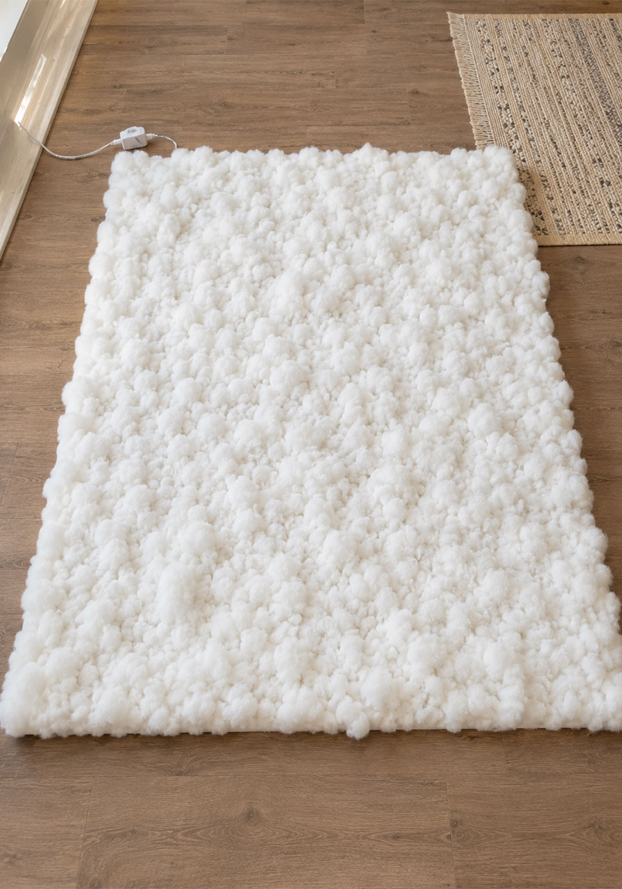 Completed polyfill cloud sheet ready to hang for Halloween ceiling display