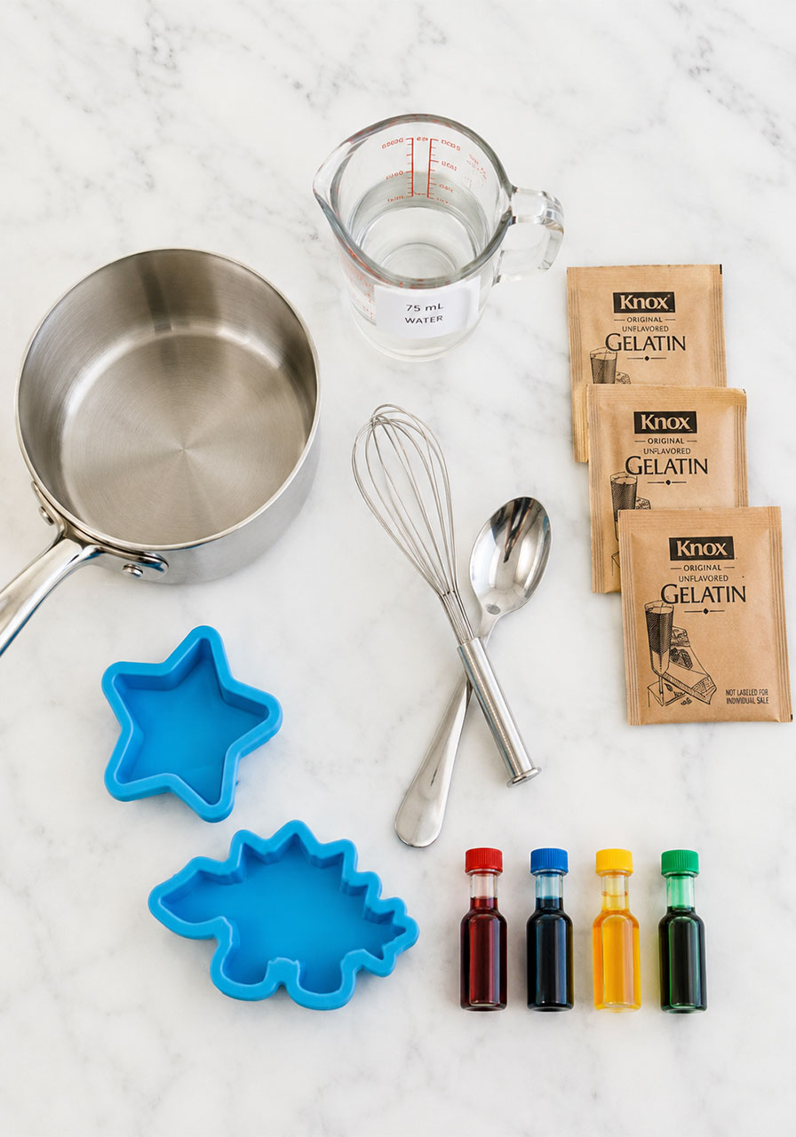 Supplies needed for gelatin bioplastic science experiment including gelatin water and molds