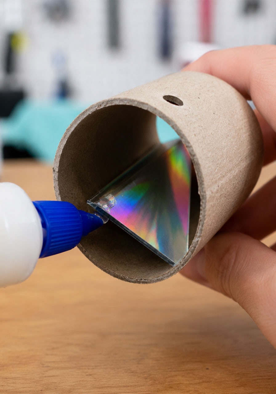 Gluing the CD wedge at the correct angle inside a cardboard spectrometer tube