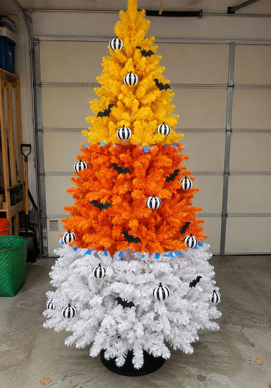 DIY candy corn striped Halloween Christmas tree with pumpkin ornaments