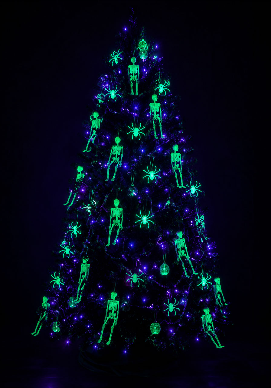 Glow-in-the-dark Halloween Christmas tree with blacklight and green glowing ornaments