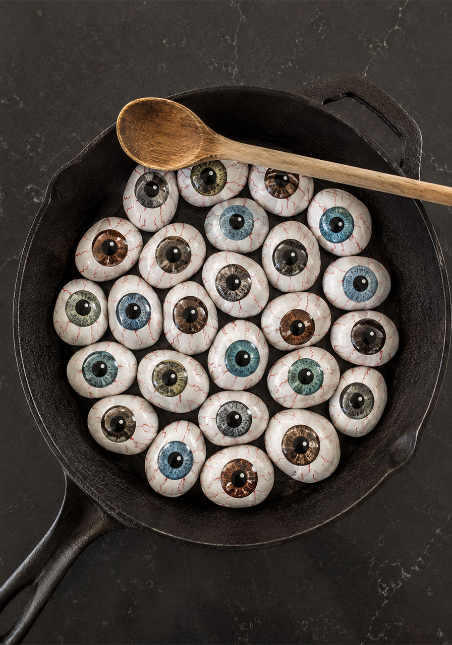 DIY painted rock eyeballs in cast iron skillet Halloween centerpiece
