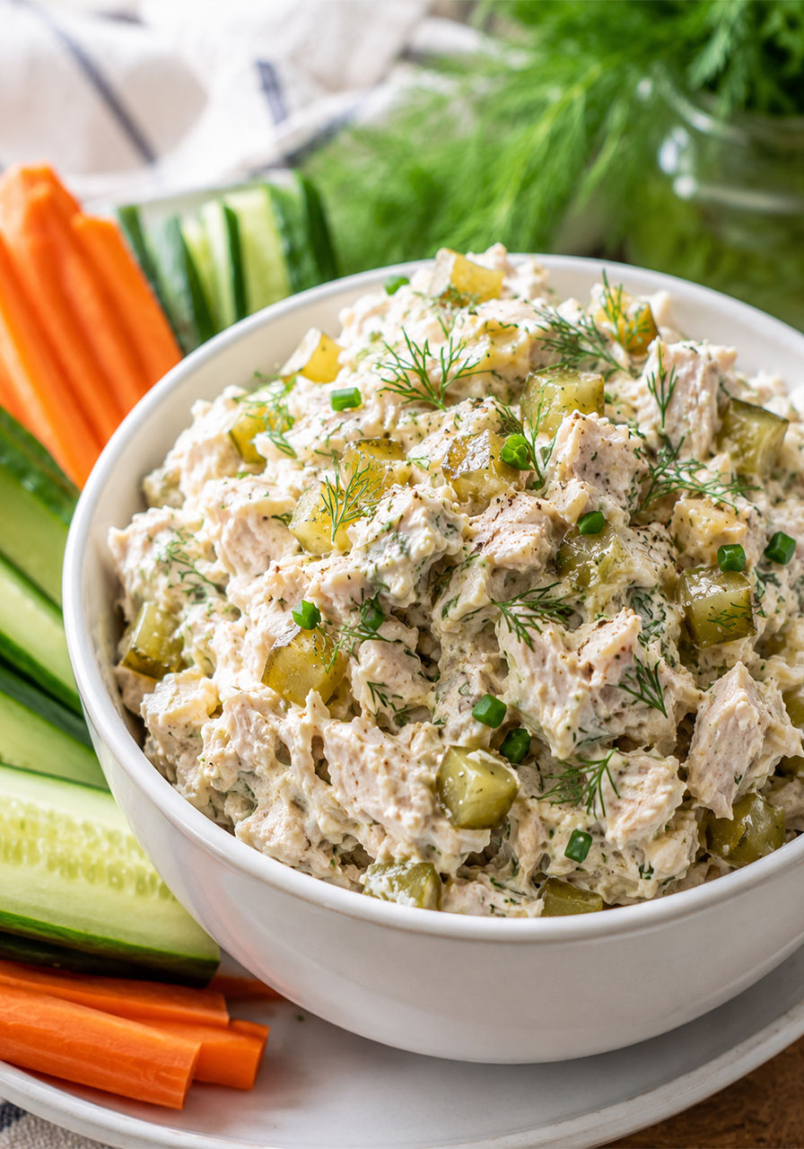 Healthy dill pickle chicken salad with fresh veggies for dipping