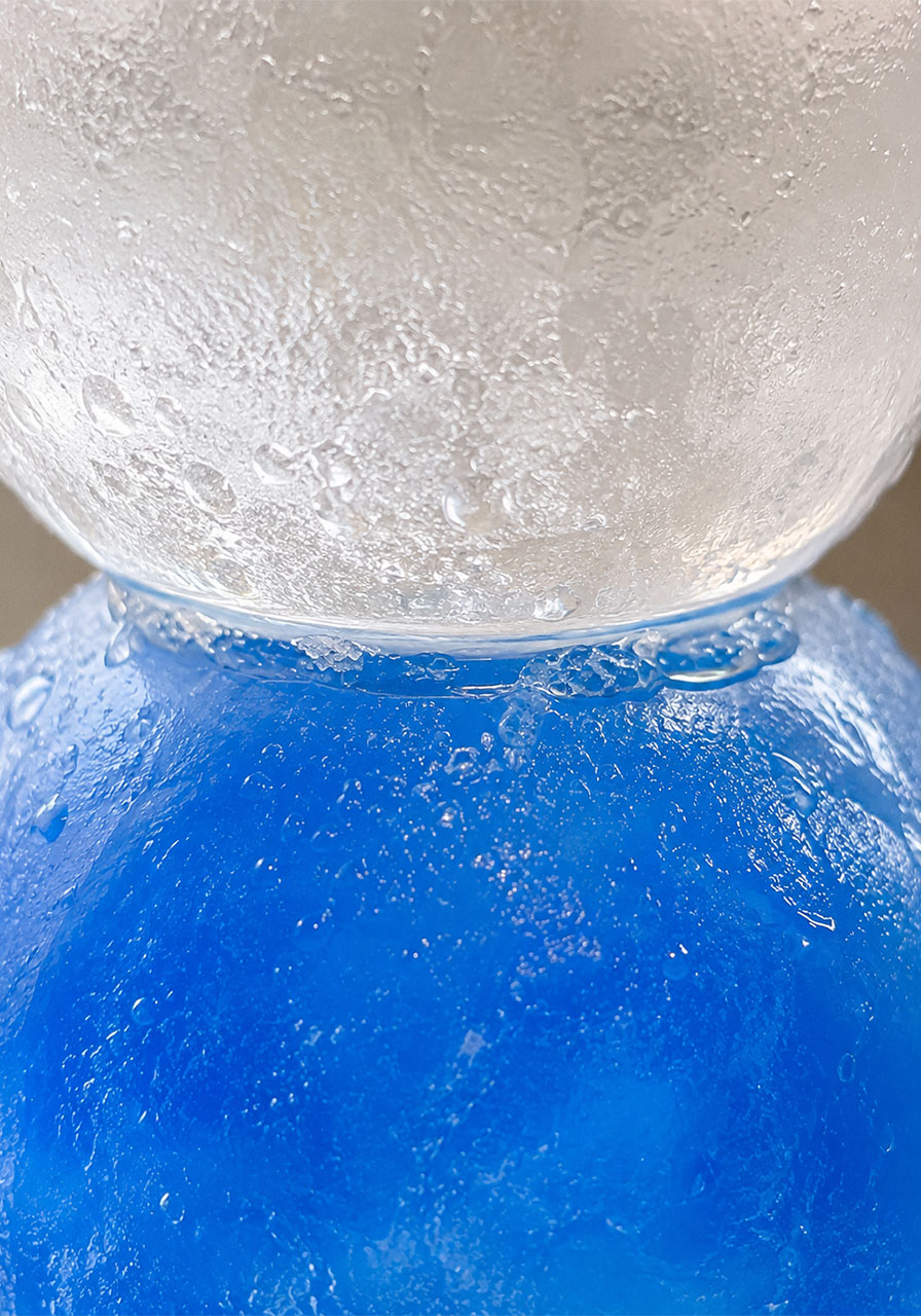 Close-up of ice refreezing at the seam, showing the science of freezing point depression