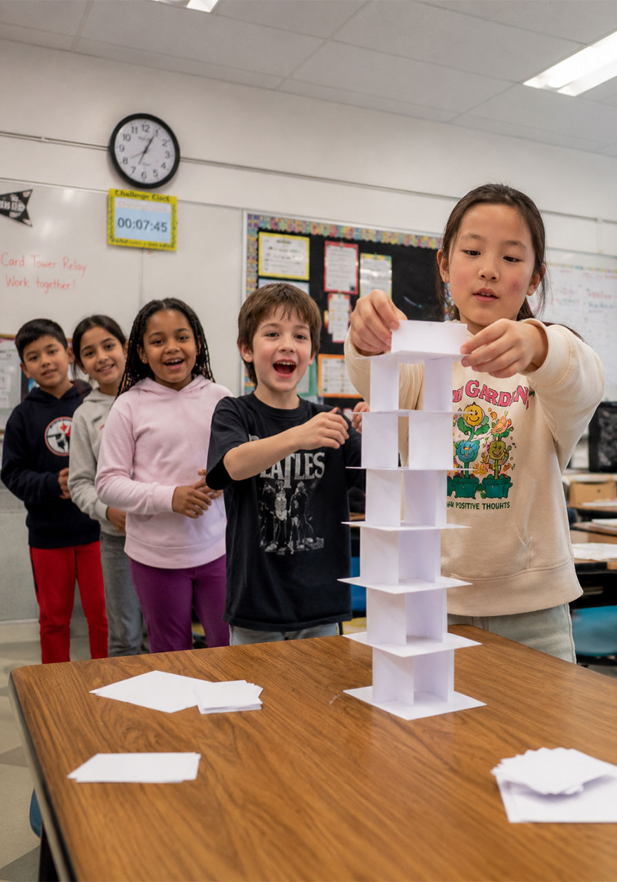 Relay-style team index card tower building STEM challenge