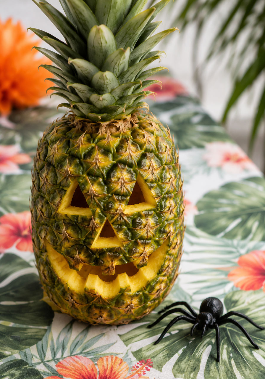 Jack-o'-lantern ideas: carved pineapple jack-o'-lantern, a fun Halloween food twist