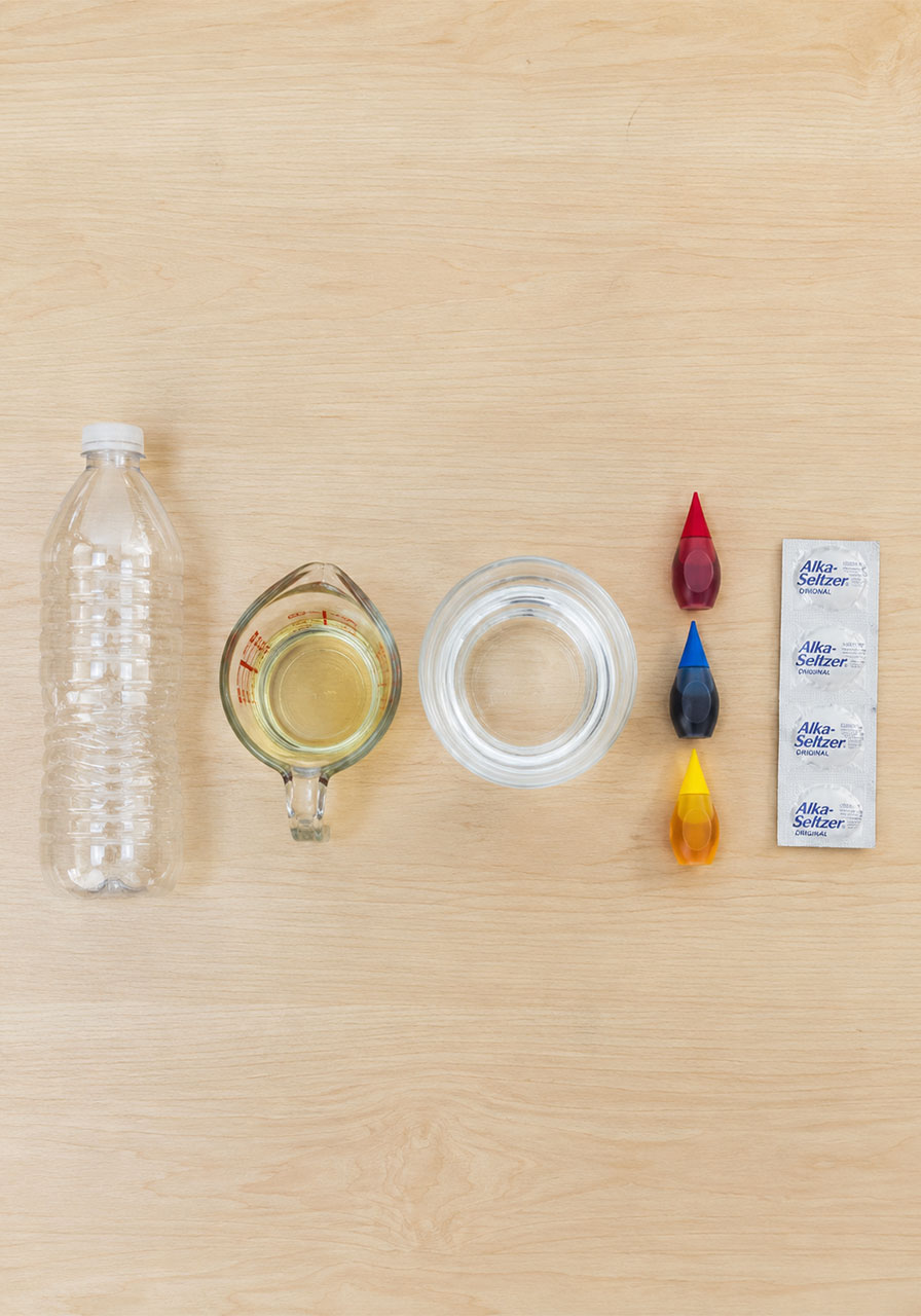 Materials needed for DIY lava lamp science experiment including oil water and Alka-Seltzer