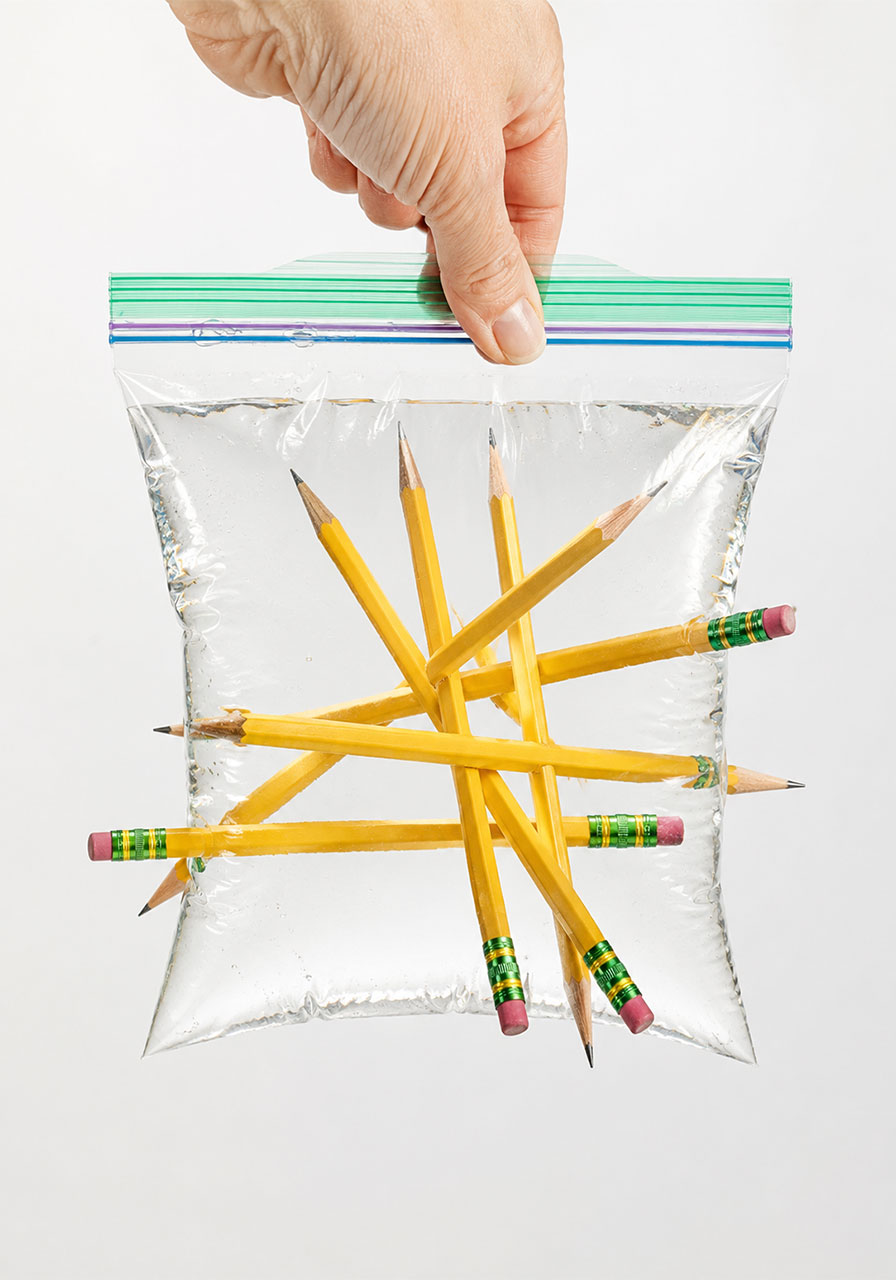 Pencils pushed through a water-filled bag with no leaks, pencil in water bag experiment