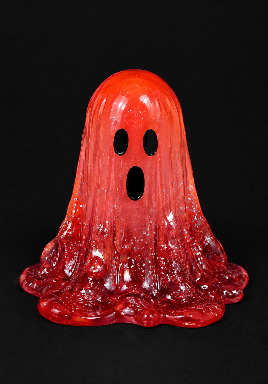 Finished blue glitter resin ghost with hand-painted spooky face