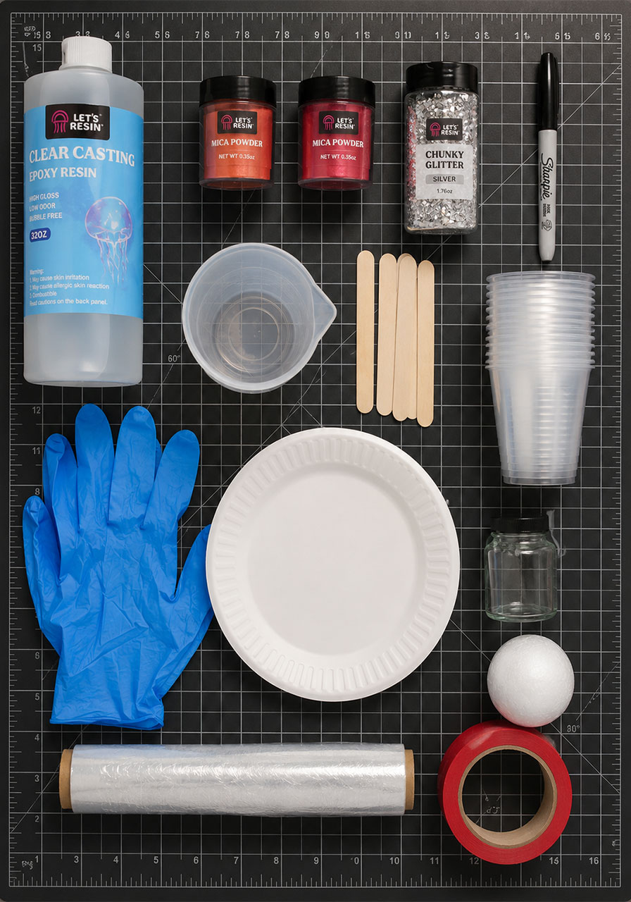 Complete supply list flatlay for making DIY resin ghost Halloween craft