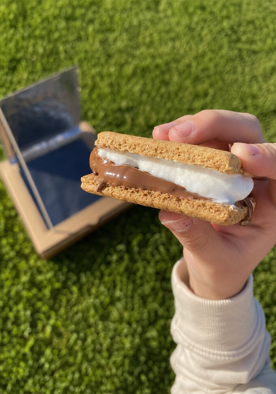 Melted s'more made using a DIY pizza box solar oven