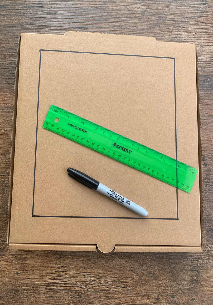 Drawing a square flap on a pizza box lid for a solar oven