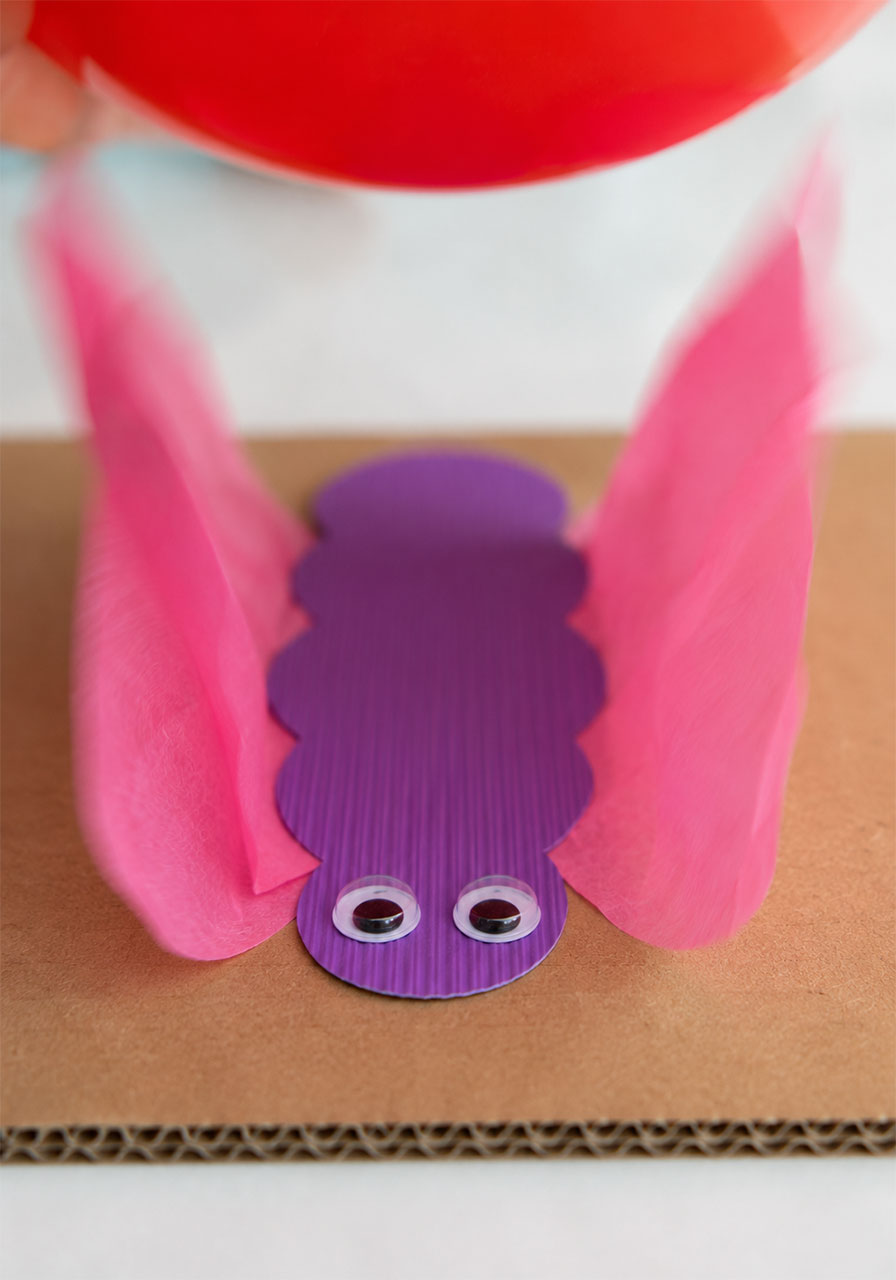 Close up of tissue paper butterfly wings lifting due to static electricity attraction