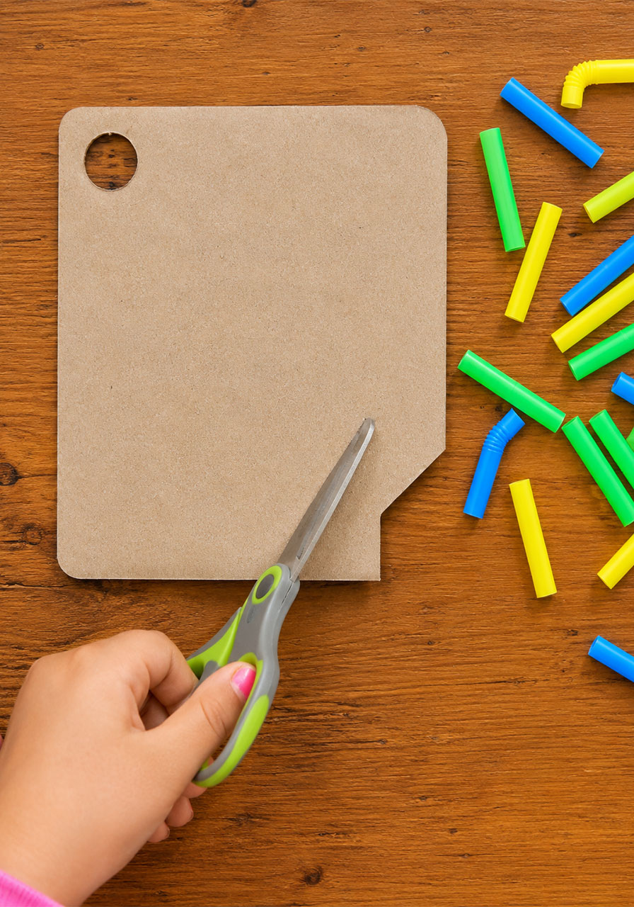 Cutting cardboard to size for DIY straw maze STEM activity
