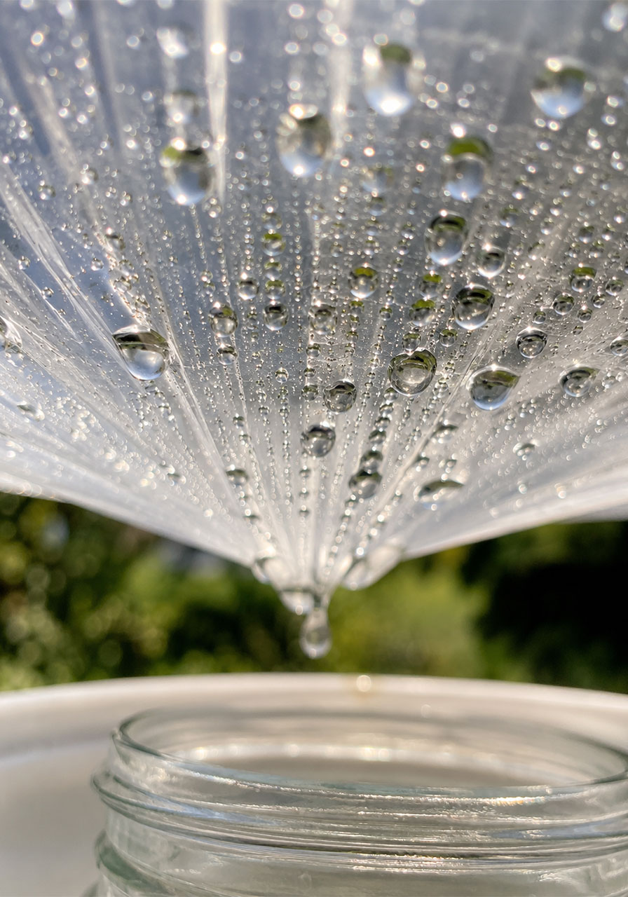 Close-up of condensation forming during a water purifier STEM activity demonstrating evaporation